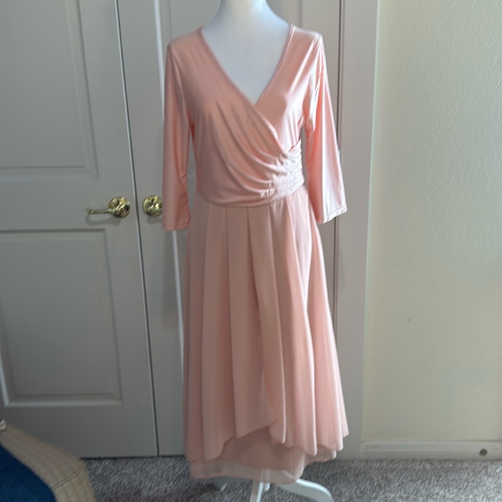 Peach colored dress, size small, bought from an ad on Facebook